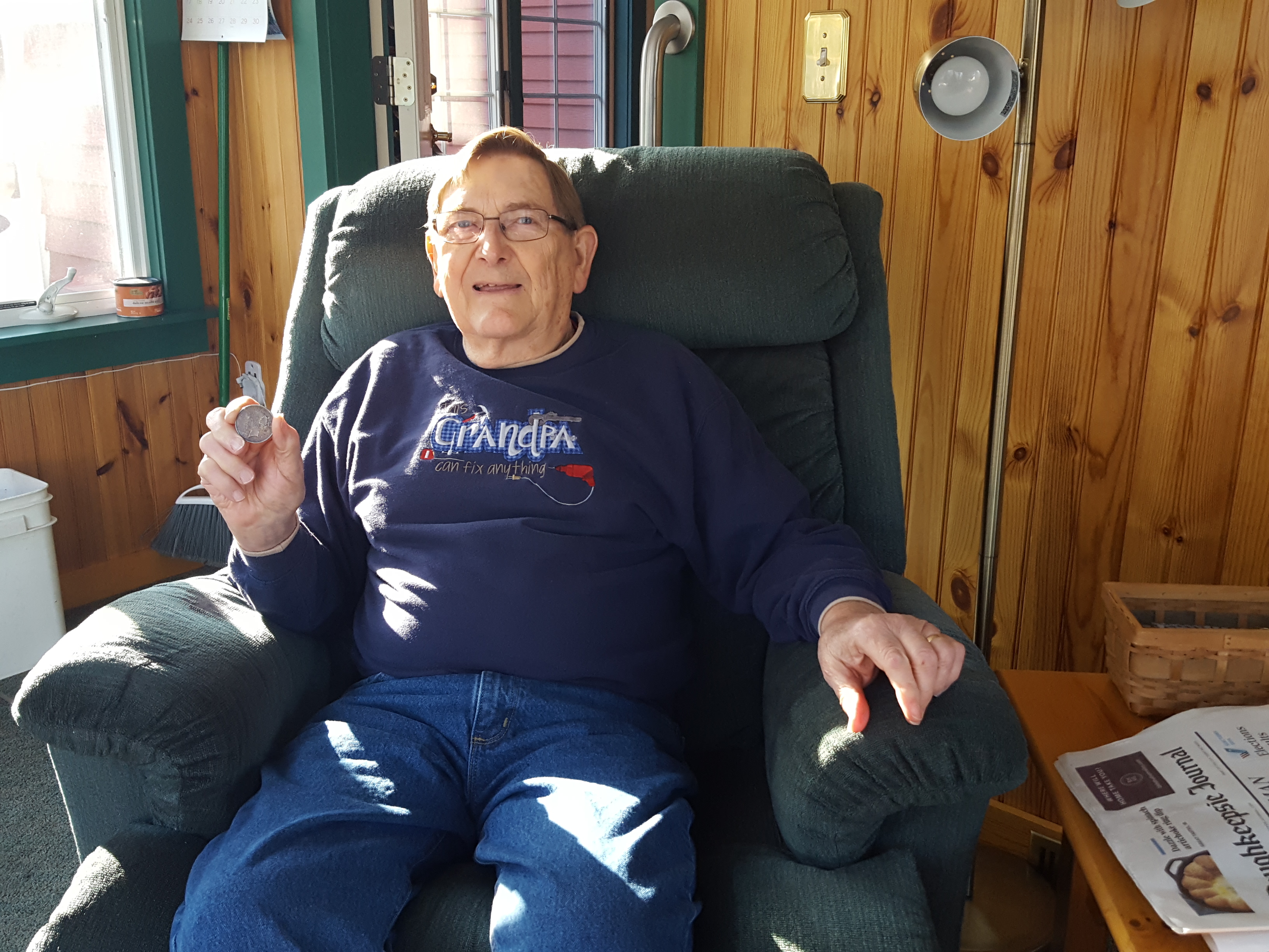 Bill holding his 1922 silver dollar.