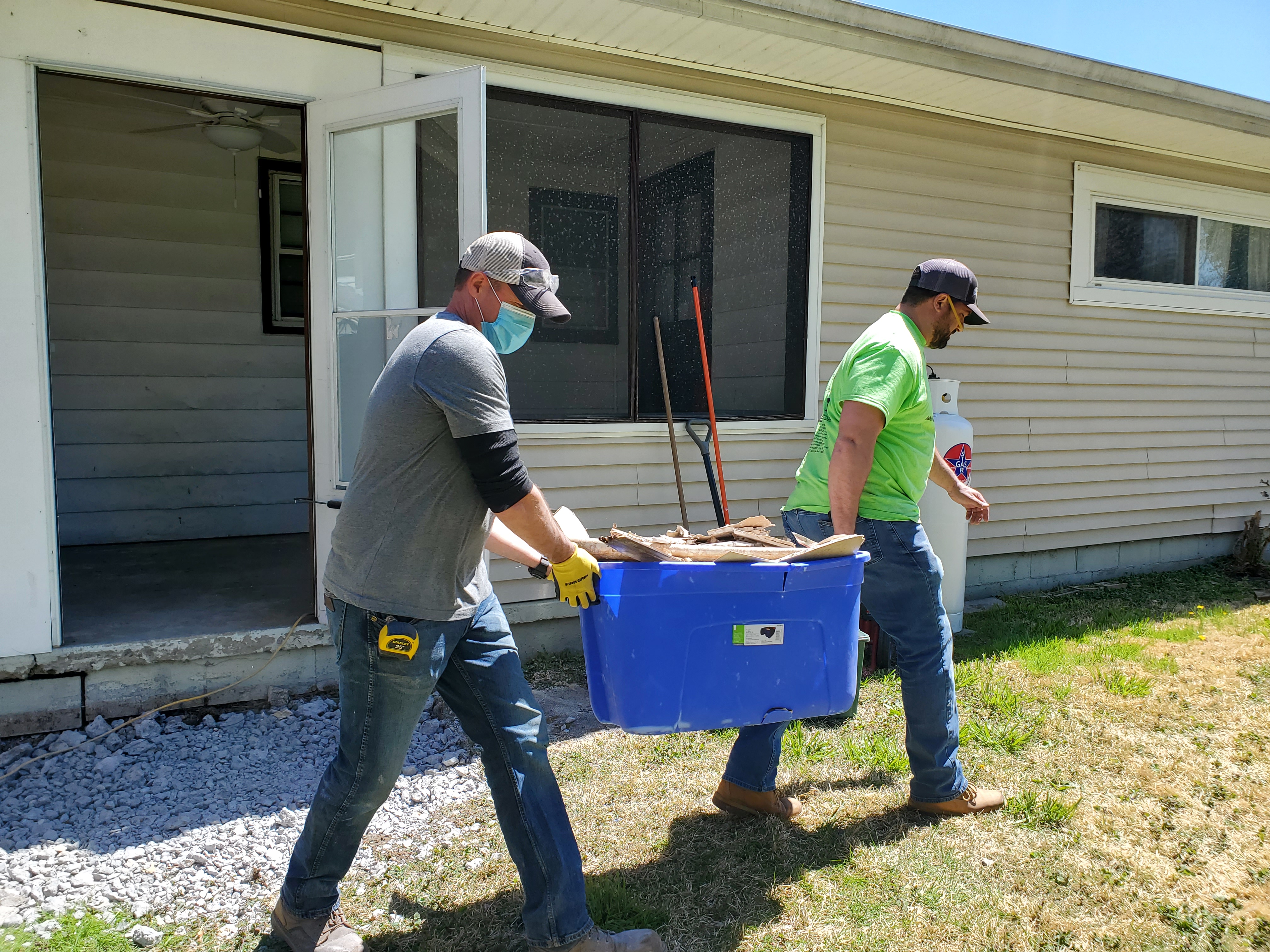 Volunteers working on Alice's home.