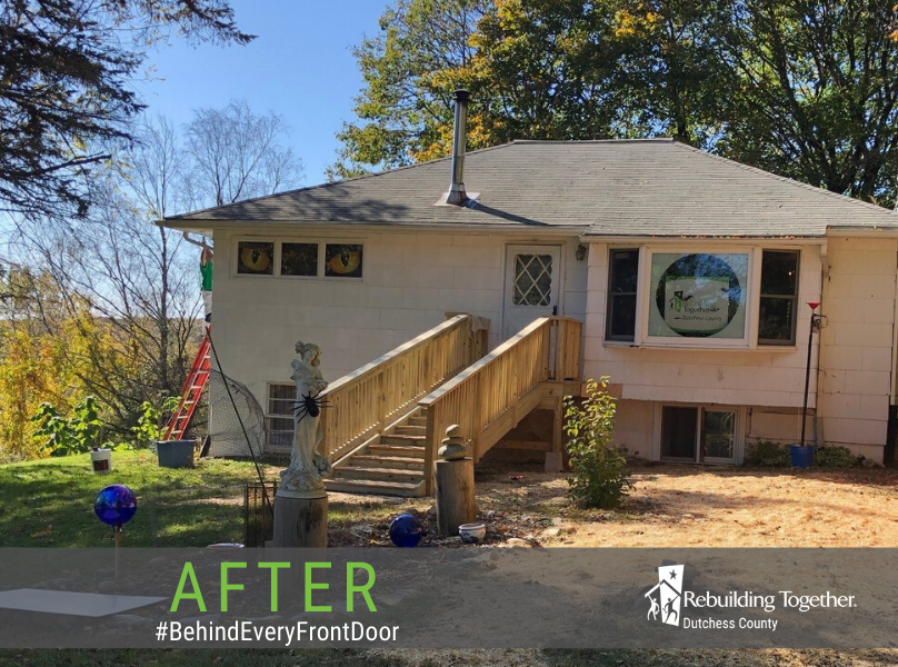 A picture of Michele's home, showing her brand new front steps.