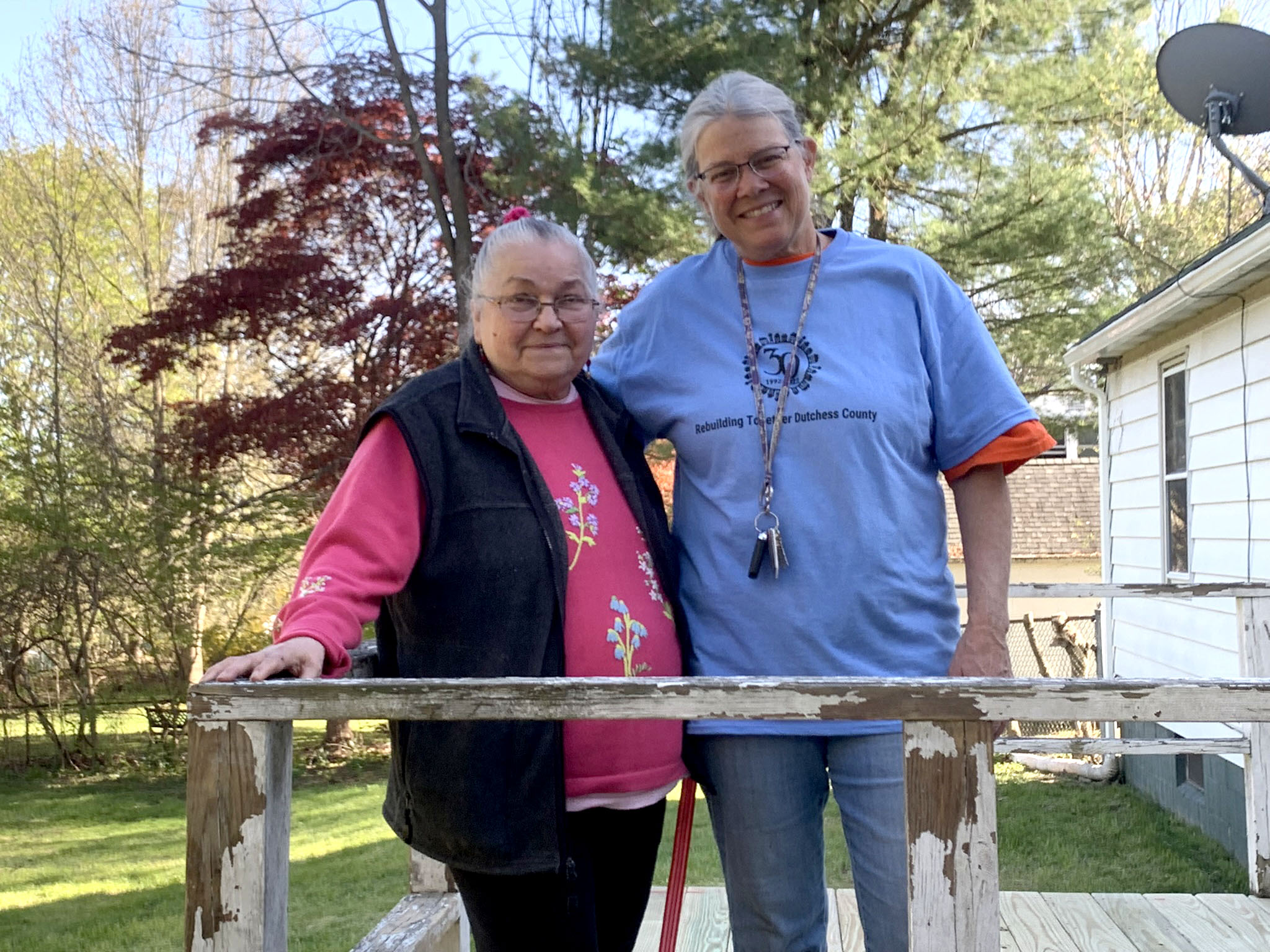 Homeowner and one of the volunteers from United Methodist Church of Hyde Park.