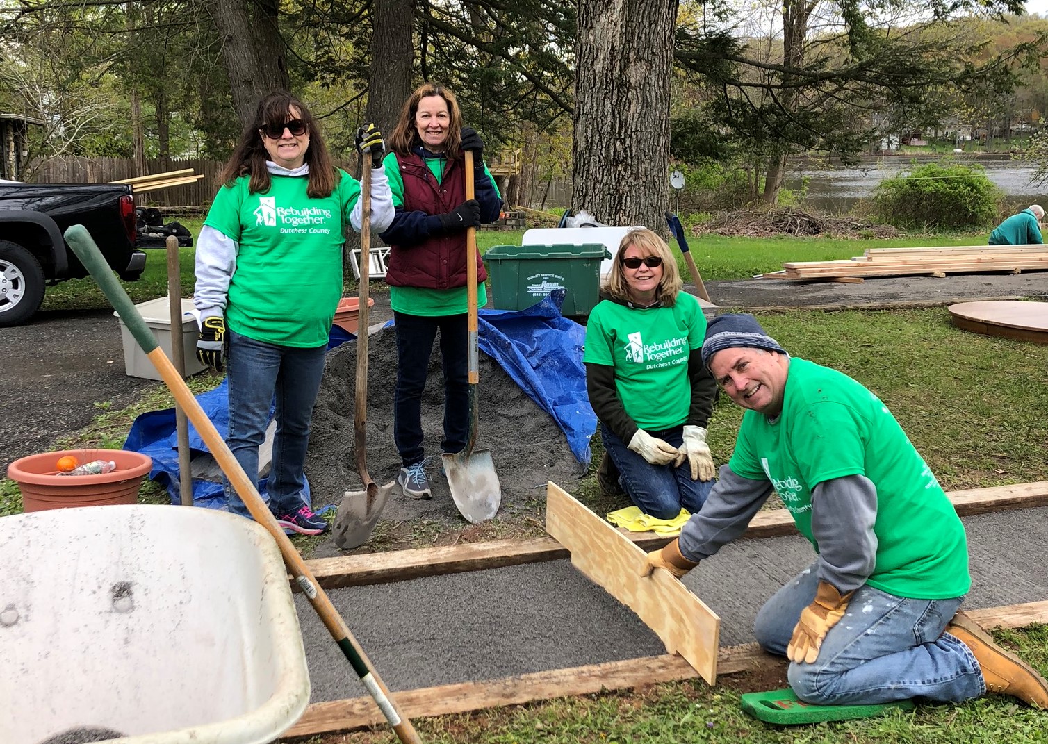 Volunteers repair the walkway for a Dutchess County resident this past April, thanks to Rebuilding Together’s Rebuilding Day program.
