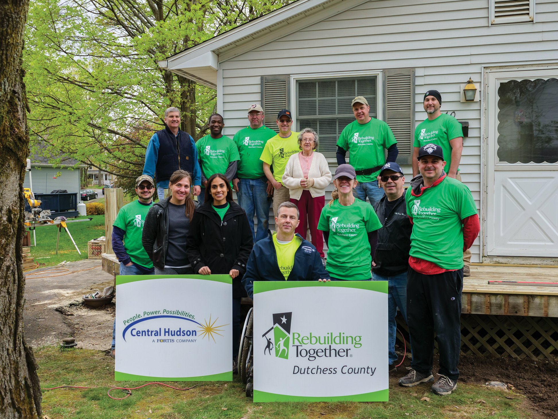 Central Hudson volunteers serving a Red Hook homeowner.