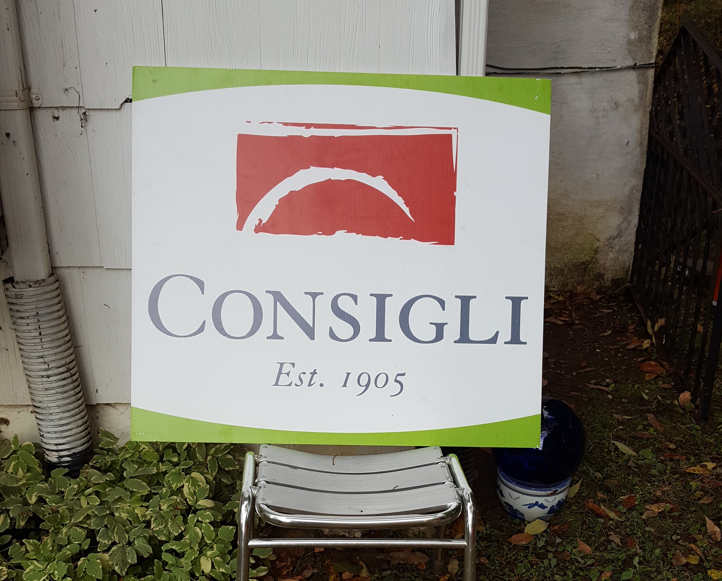 Consigli sign at a project site.